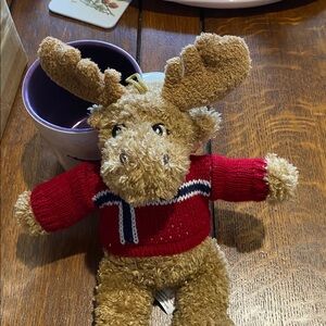 Plush Norway Moose, getting lonely. He’s wearing Norwegian Flag Sweater. EC Cute
